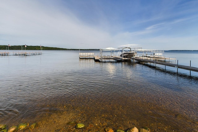 dock area featuring a water view and boat lift