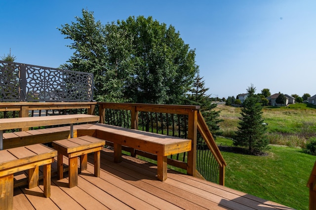 wooden deck with a yard