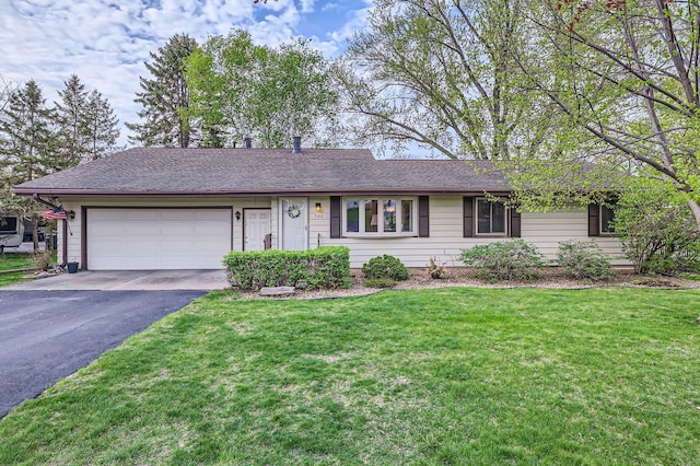 792 Gramsie Rd, Shoreview, MN 55126 - single story home with asphalt driveway, a garage, and a front lawn