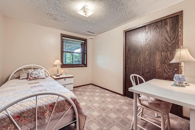 792 Gramsie Rd, Shoreview, MN 55126 - bedroom featuring a textured ceiling, light colored carpet, baseboards, and a closet