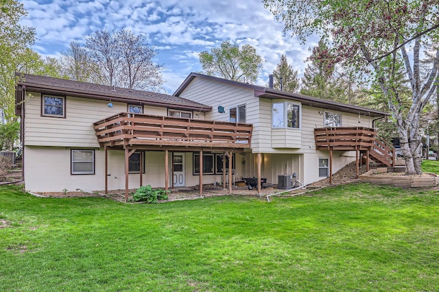 792 Gramsie Rd, Shoreview, MN 55126 - back of property featuring central AC unit, a wooden deck, and a lawn