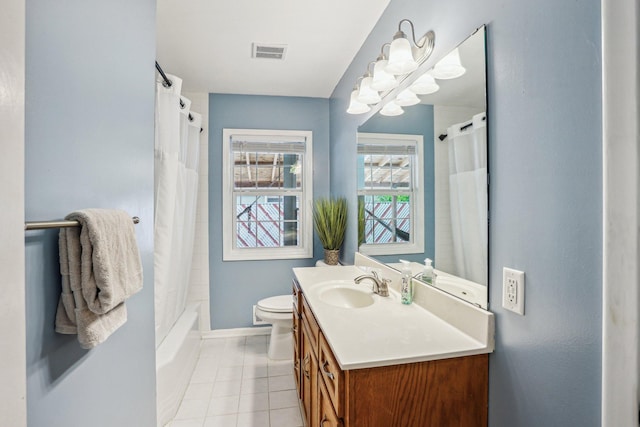 2016 90th St, Bloomington, MN 55431 - bathroom featuring vanity, toilet, tile patterned flooring, baseboards, and shower / bathtub combination with curtain