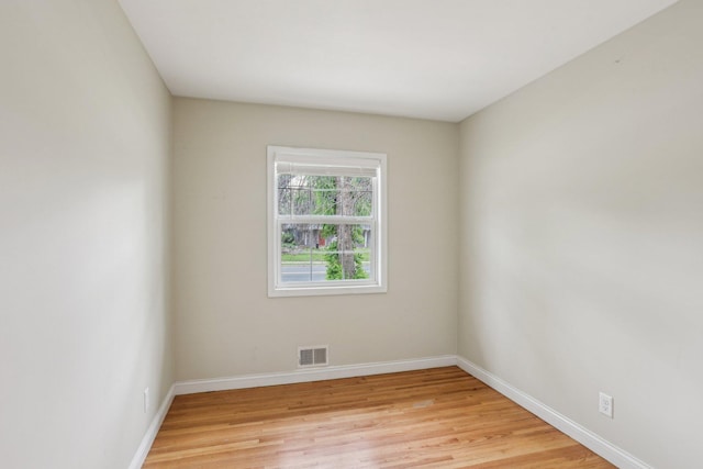 2016 90th St, Bloomington, MN 55431 - unfurnished room with light wood finished floors and baseboards