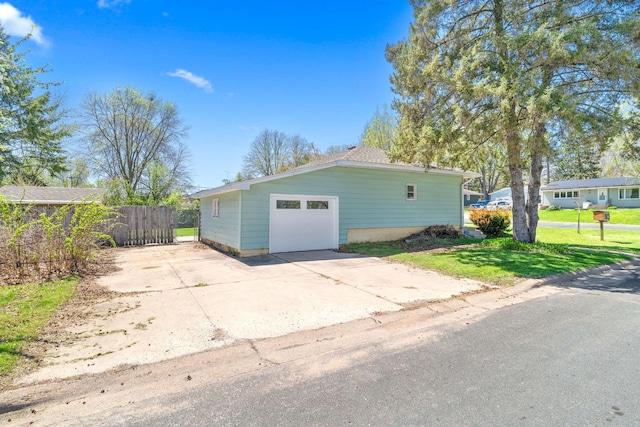 600 Mclean St, Mora, MN 55051 - garage with driveway