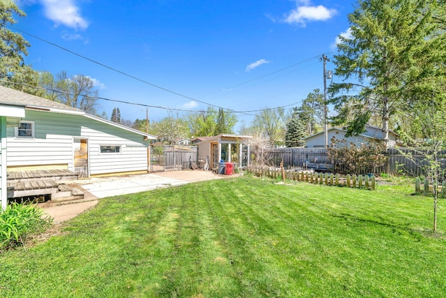 600 Mclean St, Mora, MN 55051 - view of yard featuring a patio and an outdoor structure
