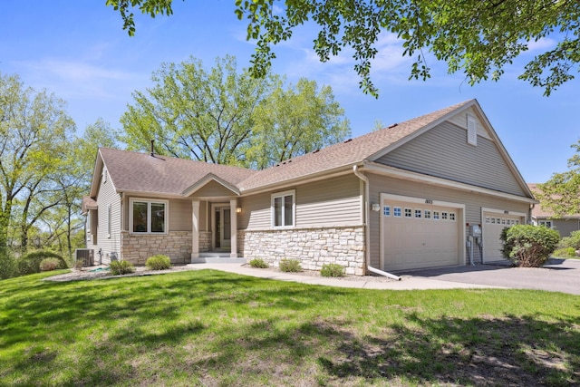 10715 57th Ave N, Plymouth, MN 55442 - view of front of house featuring an attached garage, a front lawn, and stone siding