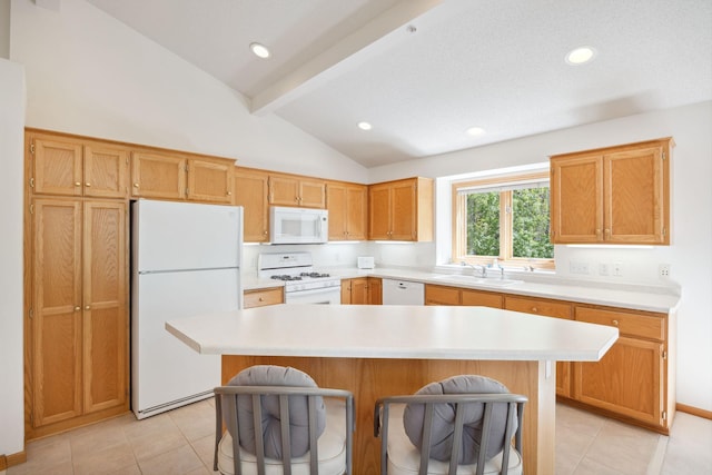 10715 57th Ave N, Plymouth, MN 55442 - kitchen with white appliances, a sink, beamed ceiling, a breakfast bar, and light countertops