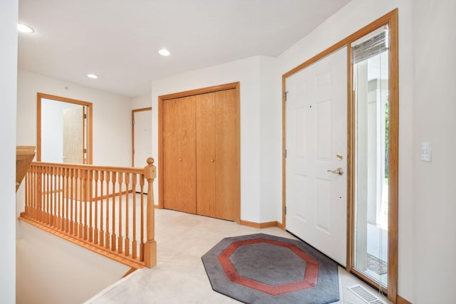 10715 57th Ave N, Plymouth, MN 55442 - foyer entrance featuring recessed lighting, healthy amount of natural light, and baseboards