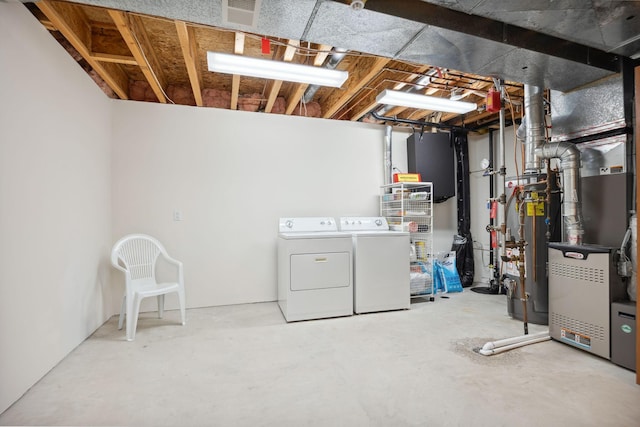 10715 57th Ave N, Plymouth, MN 55442 - unfinished below grade area featuring washing machine and clothes dryer and heating unit