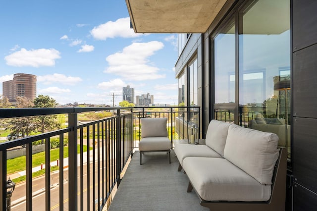 balcony featuring a city view