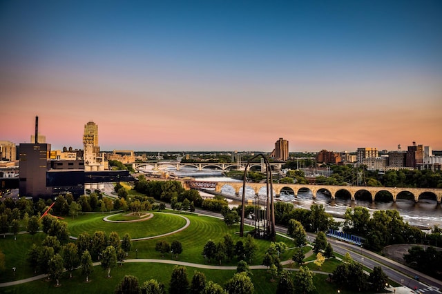 view of city featuring a notable bridge and a nearby body of water