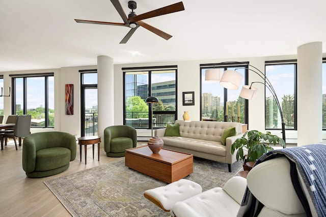 1240 2nd St Unit 301, Minneapolis, MN 55415 - living area with wood finished floors and a ceiling fan