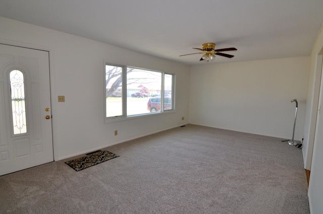 811 Pleasant Ave S, Park Rapids, MN 56470 - foyer with ceiling fan, carpet flooring, and baseboards