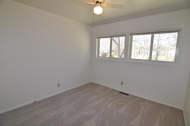 811 Pleasant Ave S, Park Rapids, MN 56470 - empty room featuring ceiling fan, carpet, baseboards, and visible vents