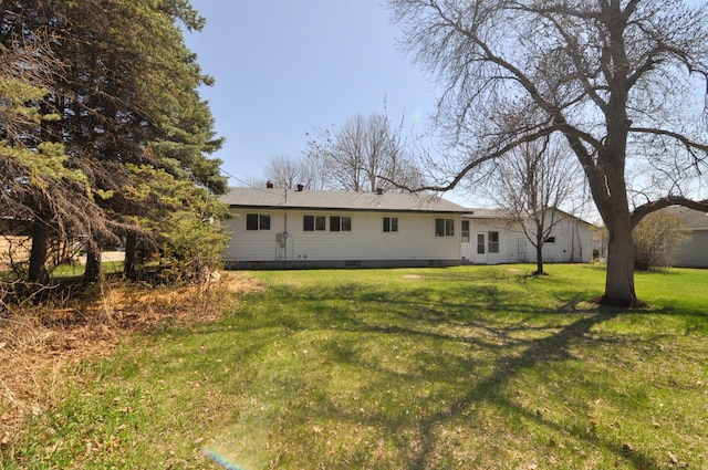 811 Pleasant Ave S, Park Rapids, MN 56470 - rear view of property featuring a yard and crawl space