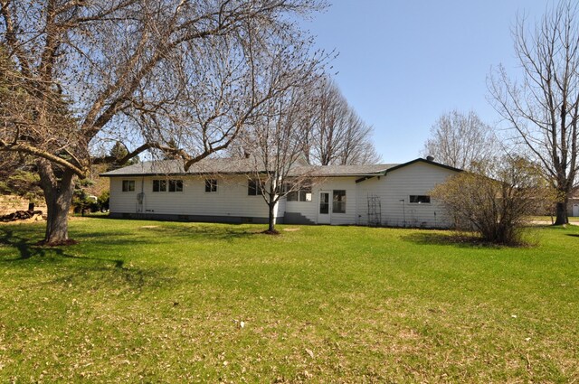 811 Pleasant Ave S, Park Rapids, MN 56470 - rear view of property featuring a yard and crawl space