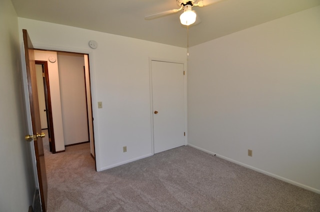 811 Pleasant Ave S, Park Rapids, MN 56470 - unfurnished bedroom featuring carpet flooring, baseboards, and ceiling fan