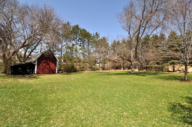 811 Pleasant Ave S, Park Rapids, MN 56470 - view of yard with an outbuilding and a barn