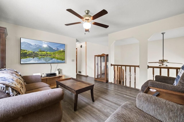 12201 Olive St NW, Coon Rapids, MN 55448 - living room featuring a ceiling fan and wood finished floors