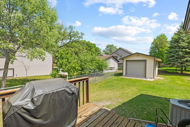 12201 Olive St NW, Coon Rapids, MN 55448 - wooden terrace featuring central air condition unit, area for grilling, a garage, and an outdoor structure