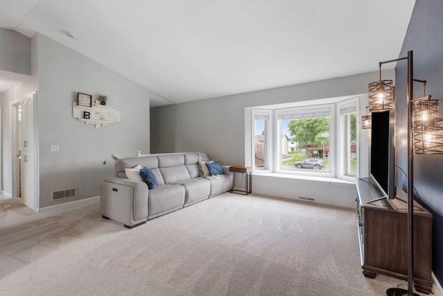 5046 Mitchell Rd, Big Lake, MN 55309 - living area with carpet flooring and vaulted ceiling