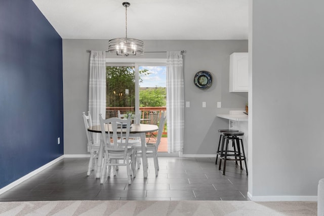 5046 Mitchell Rd, Big Lake, MN 55309 - dining area with a chandelier and baseboards