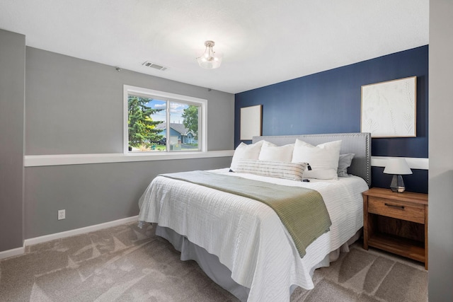 5046 Mitchell Rd, Big Lake, MN 55309 - bedroom with carpet, baseboards, and a chandelier