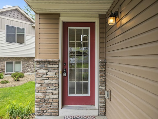 9185 Golden Pond Ln N, Monticello, MN 55362 - view of exterior entry featuring stone siding