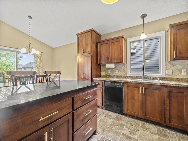 9185 Golden Pond Ln N, Monticello, MN 55362 - kitchen featuring dishwasher, a sink, tasteful backsplash, lofted ceiling, and hanging light fixtures
