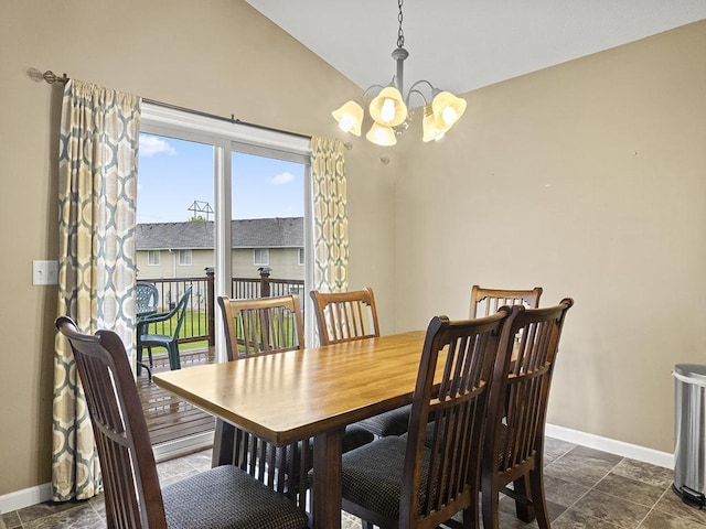 9185 Golden Pond Ln N, Monticello, MN 55362 - dining space with baseboards, a chandelier, vaulted ceiling, and dark stone finish floors
