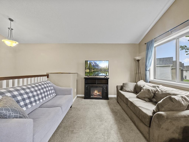 9185 Golden Pond Ln N, Monticello, MN 55362 - living room featuring carpet flooring, baseboards, and a glass covered fireplace