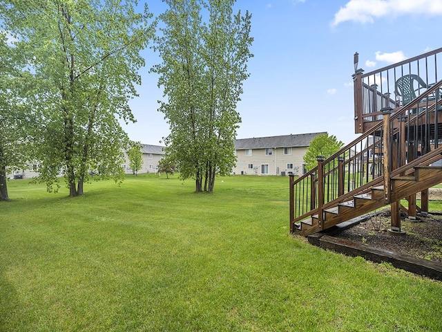 9185 Golden Pond Ln N, Monticello, MN 55362 - view of grassy yard featuring stairs