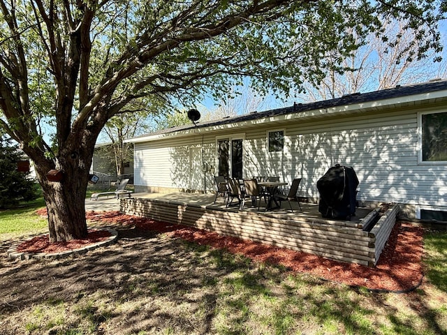 back of property featuring a patio