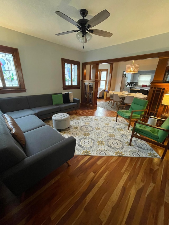 living room featuring wood finished floors and ceiling fan