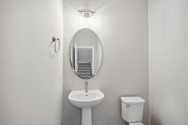 6754 Wildflower Way, Minnetrista, MN 55331 - half bath with toilet and a sink