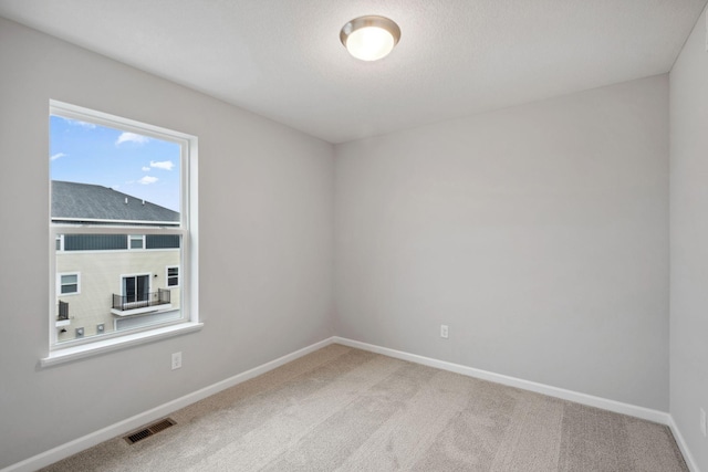 6754 Wildflower Way, Minnetrista, MN 55331 - empty room featuring carpet flooring and baseboards