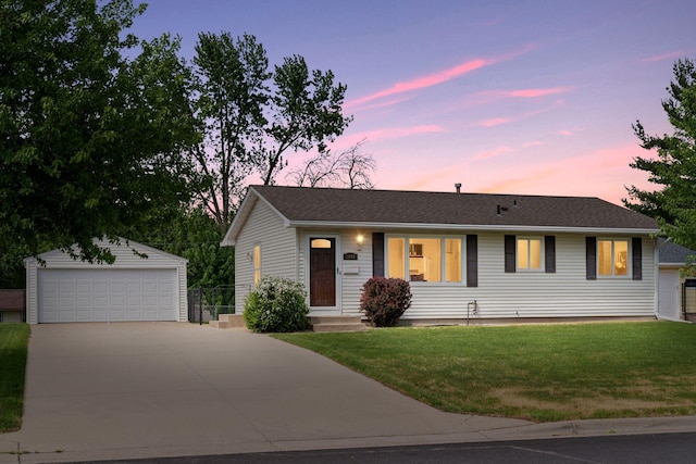 3697 75th St E, Inver Grove Heights, MN 55076 - ranch-style home featuring an outbuilding, a garage, and a front yard