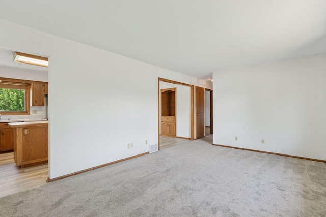 3697 75th St E, Inver Grove Heights, MN 55076 - unfurnished room with light colored carpet and baseboards