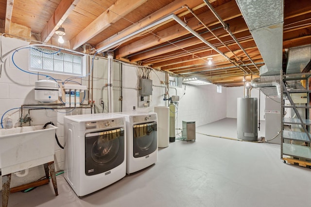 3697 75th St E, Inver Grove Heights, MN 55076 - basement featuring independent washer and dryer, gas water heater, electric panel, a sink, and a water softener