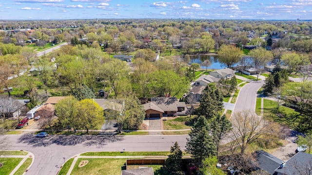 bird's eye view with a water view and a residential view