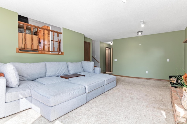 living room with carpet, stairway, and baseboards