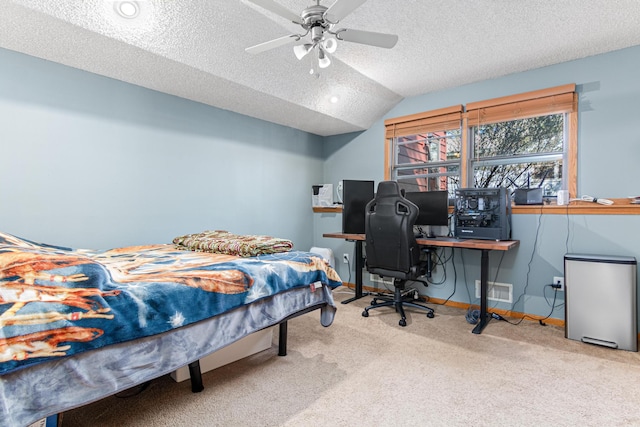 bedroom with carpet floors, a textured ceiling, baseboards, vaulted ceiling, and ceiling fan