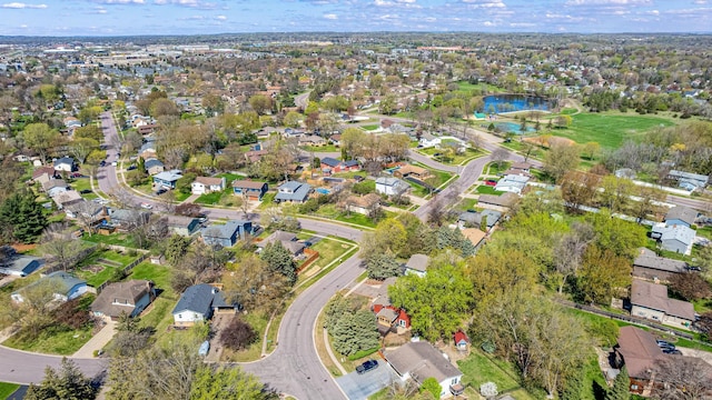 aerial view featuring a water view and a residential view