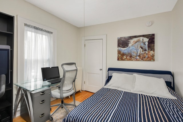 1828 Clinton Ave Unit 3, Minneapolis, MN 55404 - bedroom with light wood-type flooring and a desk
