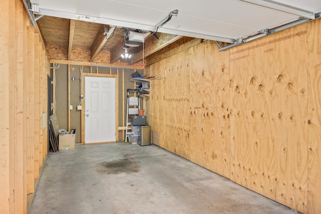 1828 Clinton Ave Unit 3, Minneapolis, MN 55404 - garage with a garage door opener and wooden walls