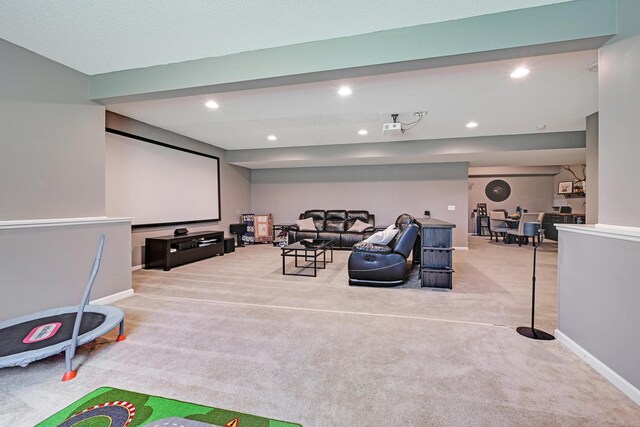 home theater featuring carpet flooring, recessed lighting, and baseboards