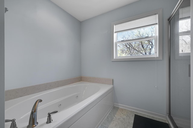 12766 Legacy Creek Pkwy NE, Blaine, MN 55449 - bathroom featuring a jetted tub, baseboards, and a shower stall