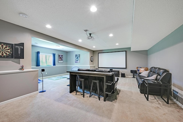 12766 Legacy Creek Pkwy NE, Blaine, MN 55449 - cinema room with carpet flooring, recessed lighting, a textured ceiling, and baseboards
