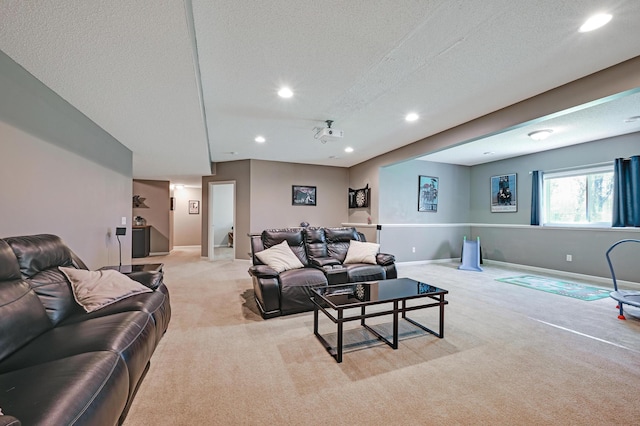 12766 Legacy Creek Pkwy NE, Blaine, MN 55449 - living room with light colored carpet, recessed lighting, a textured ceiling, and baseboards