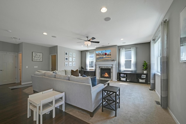 12766 Legacy Creek Pkwy NE, Blaine, MN 55449 - living room with baseboards, a fireplace, recessed lighting, and a ceiling fan